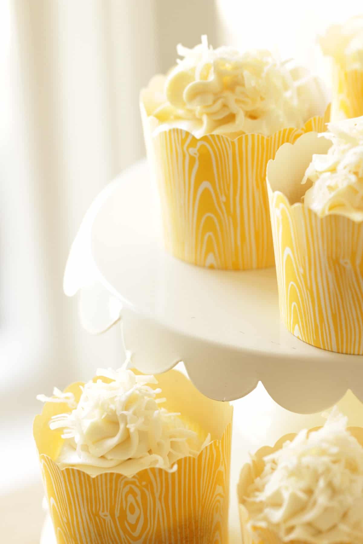 Cupcakes on a edge of a cake stand