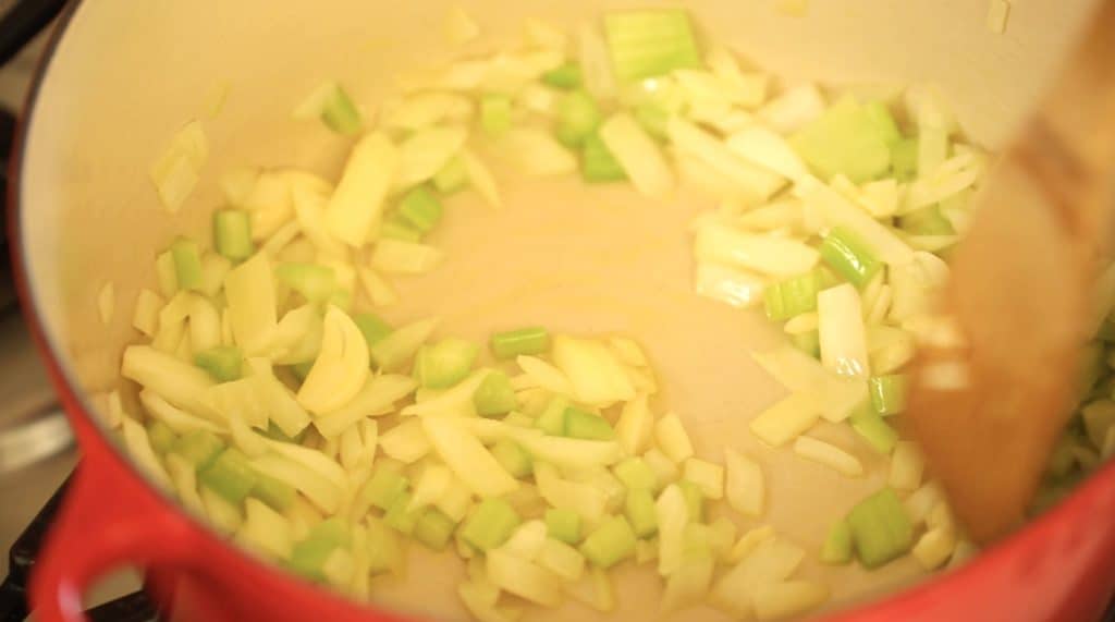 Onions and Celery in pot for a Potato Cheddar Bacon Soup Recipe
