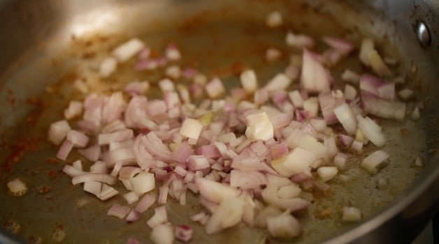 cooking shallots in a skillet