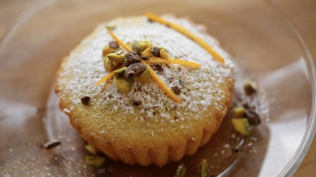 Pistachio Olive Oil Cake on Plate served with garnishes