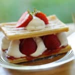 2-layer strawberry napoleon on a glass plate with fork