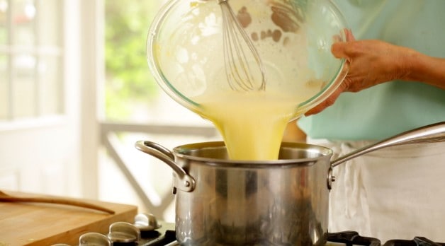 Egg custard poured into a sauce pan