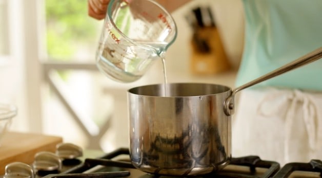 Water poured into sauce pan