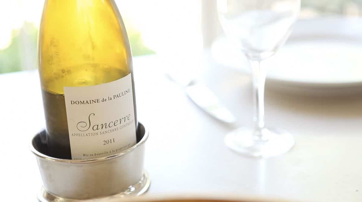 a bottle of sancerre wine on a table