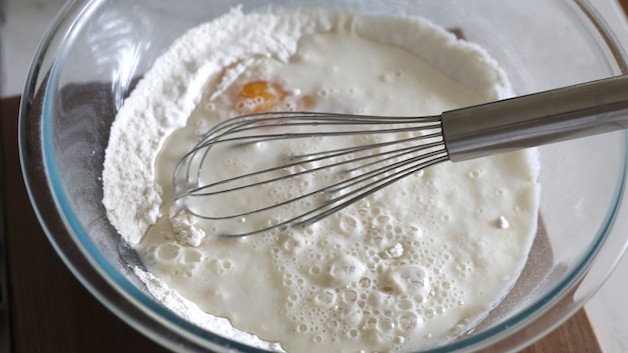 waffle batter in a bowl about to be mixed