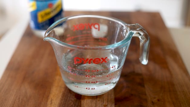 Pyrex Measuring Pitcher filled with Club Soda