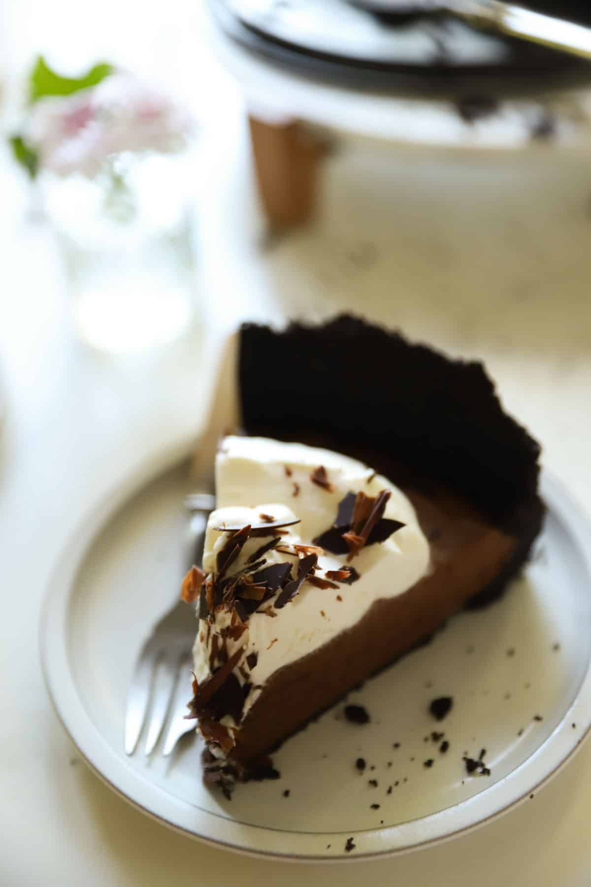 Chocolate mousse cake slice on a plate