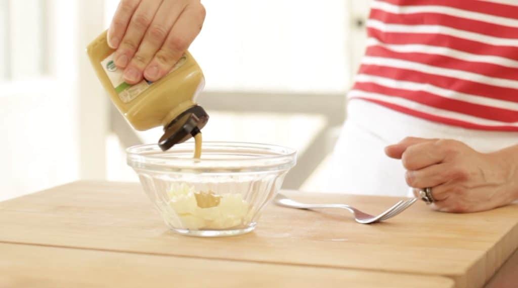 Adding Mustard to a Bowl of Mayonaise