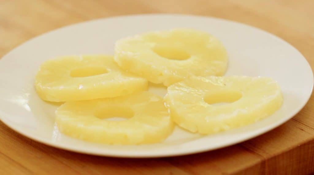 Sliced Pineapple on a white Plate