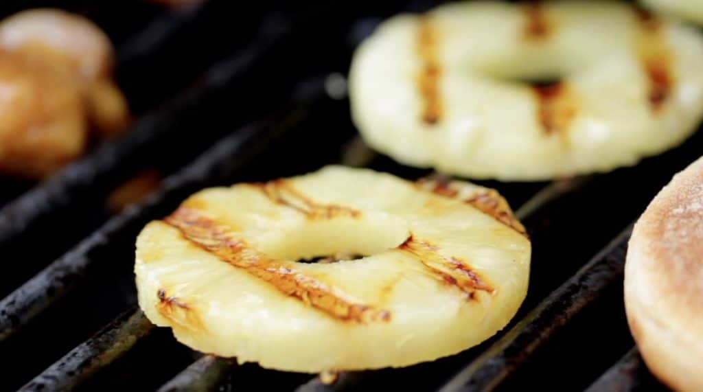 Grilling Pineapple slices on a BBQ