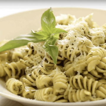 How to Make Pesto Sauce served with pasta in a white bowl
