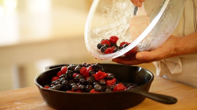 Berries poured into cast iron skillet