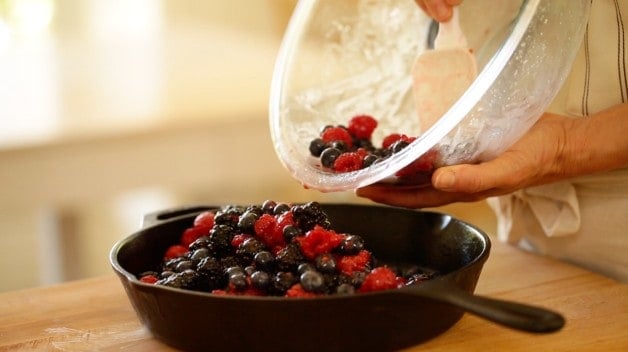 Berries poured into cast iron skillet