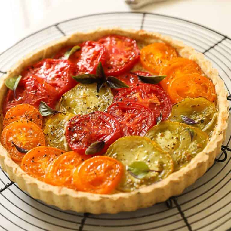 A French Tomato Tart on a cooling rack.