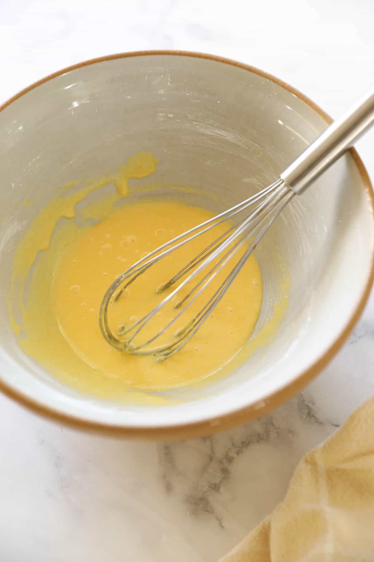 egg yolks sugar and cornstarch in a bowl