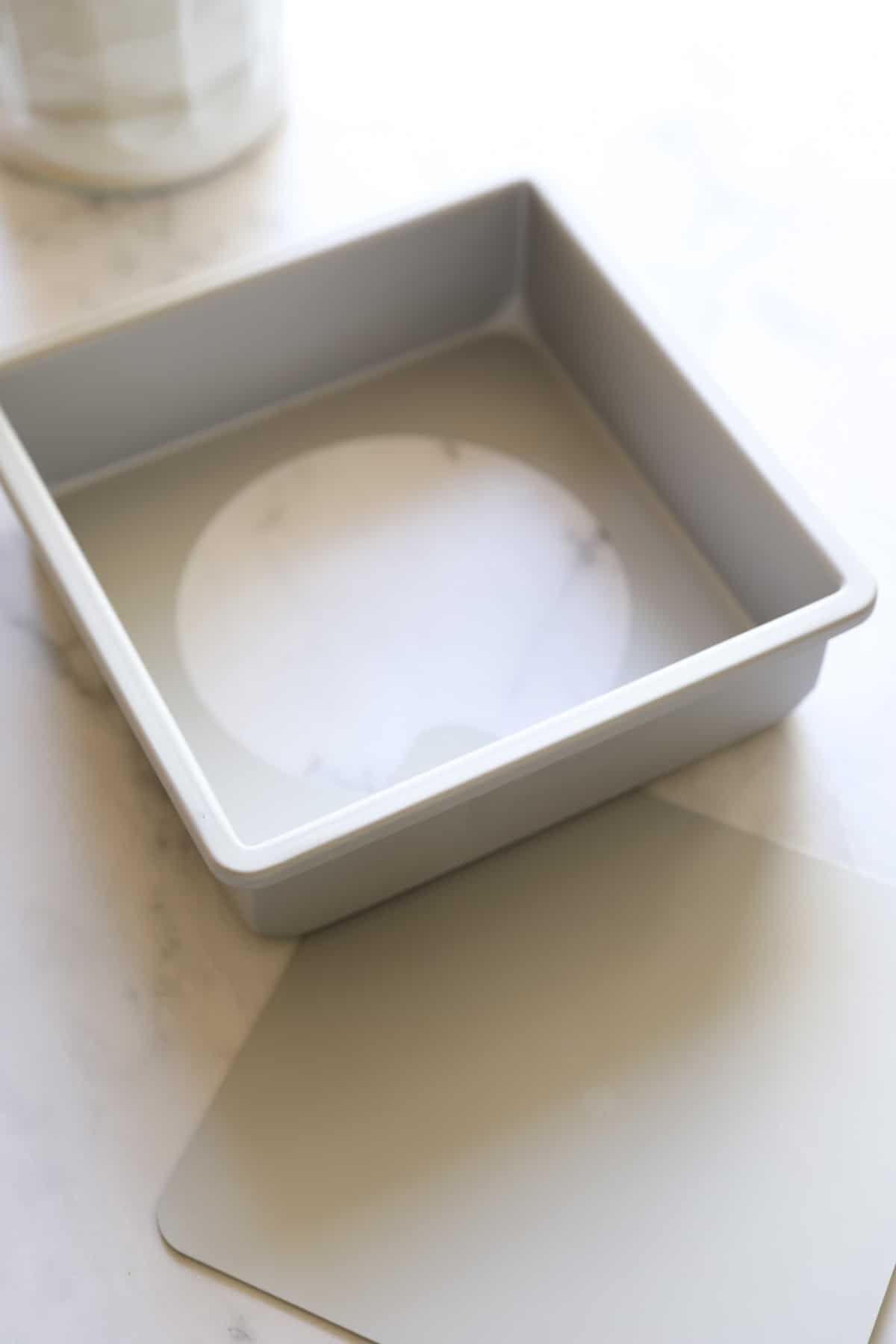 a removable bottom brownie tin on a counter