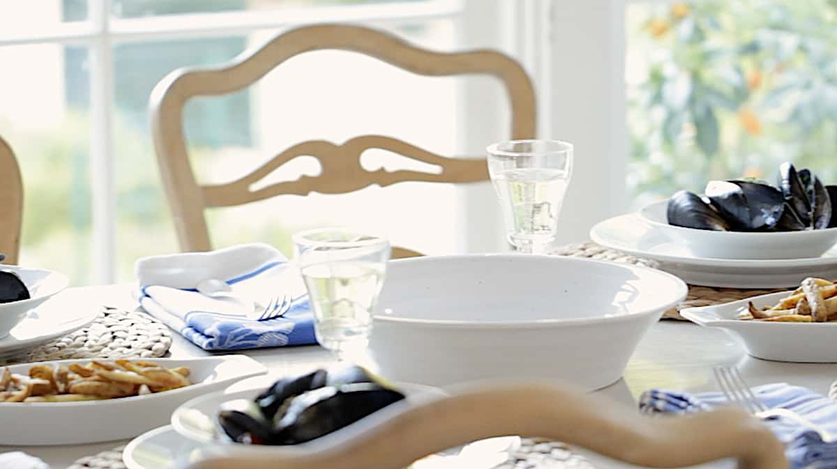 a table set for serving mussels