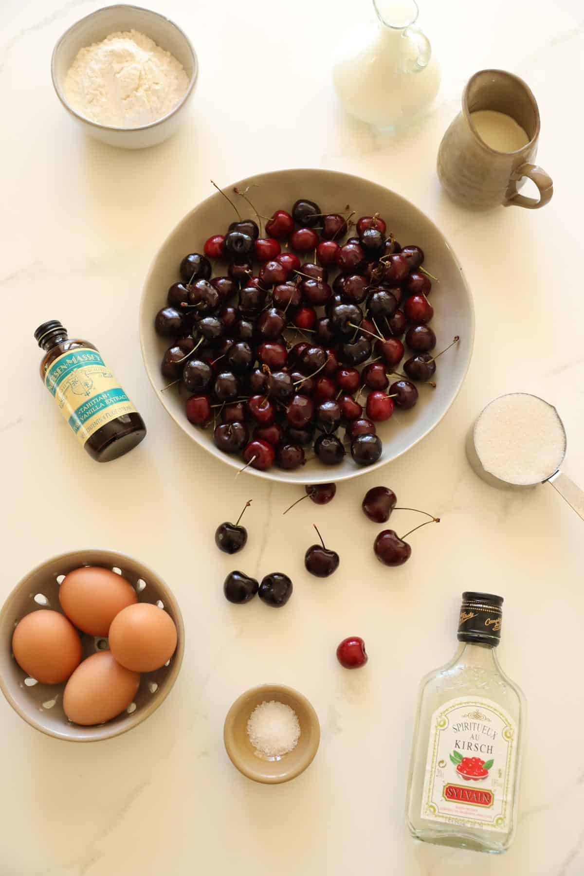 Ingredients for Cherry Clafoutis on a counter