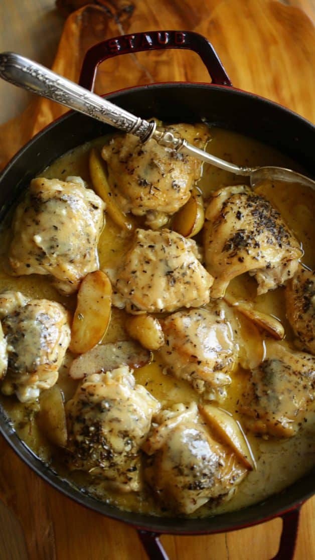 Overhead shot of a one pot chicken and potato recipe served in a large braiser
