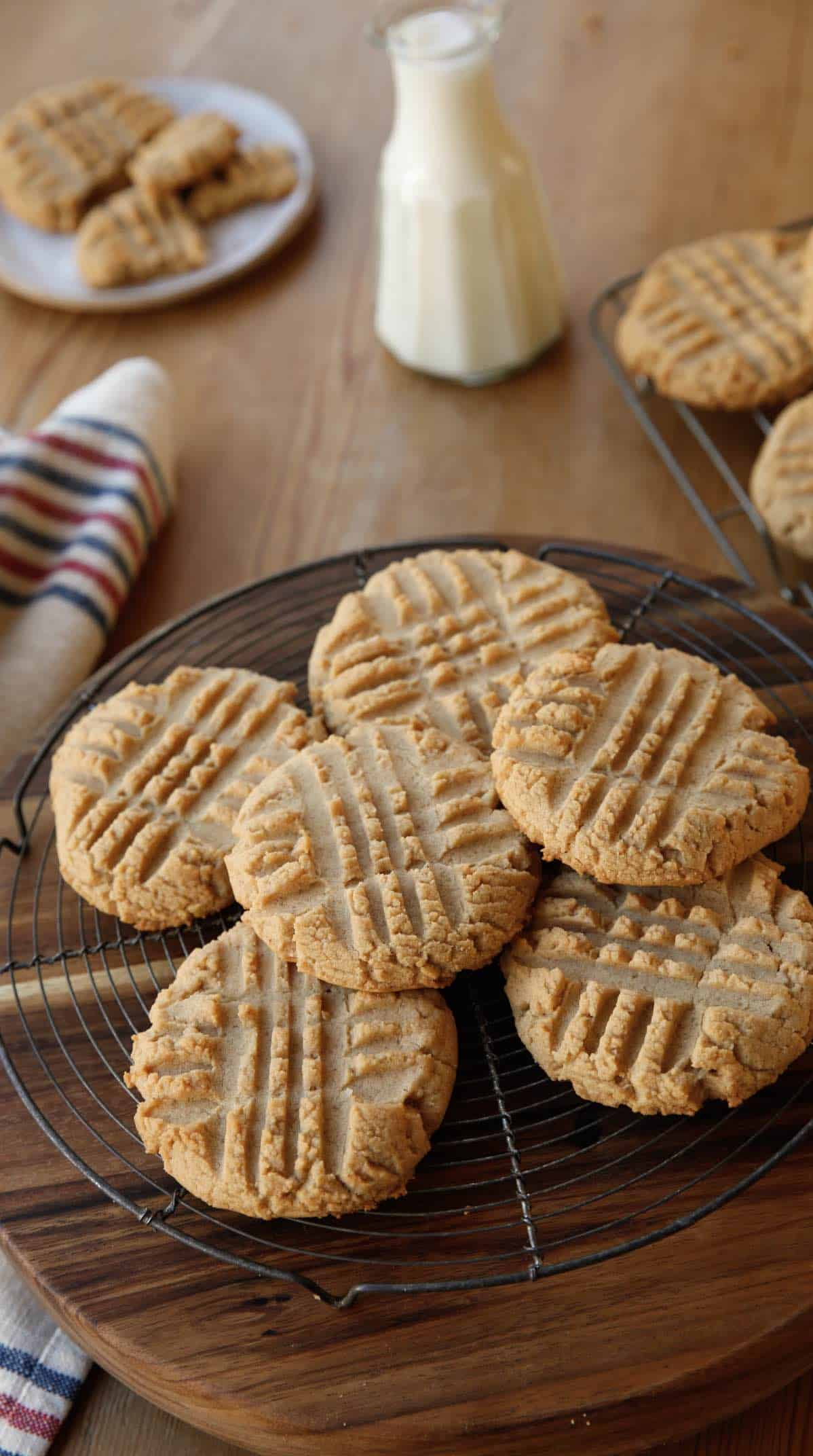 a plate of freshly baked cookies on a cooling rack