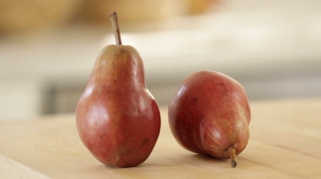 Red Pears on a cutting board