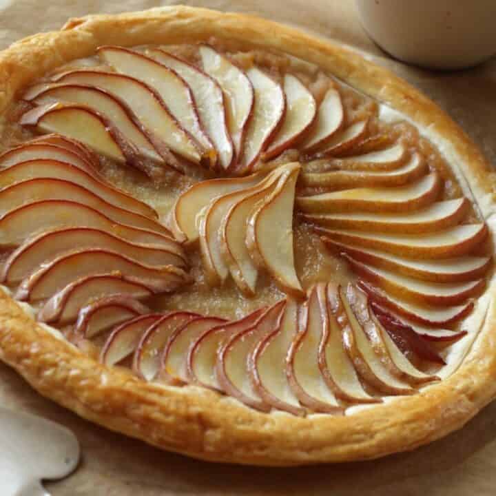 Pear Tart made with puff pastry on a board