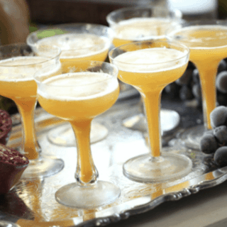 Pumpkin Punch served in champagne coupes on a silver platter