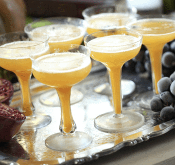 Pumpkin Punch served in champagne coupes on a silver platter