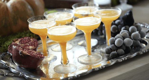 Pumpkin Punch served in champagne coupes on a silver platter