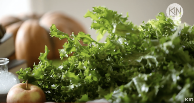 spikey looking lettuce on a board