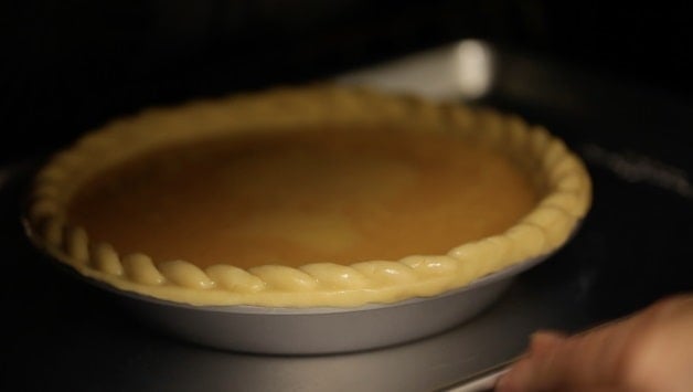 Pumpkin pie baking in the oven baking