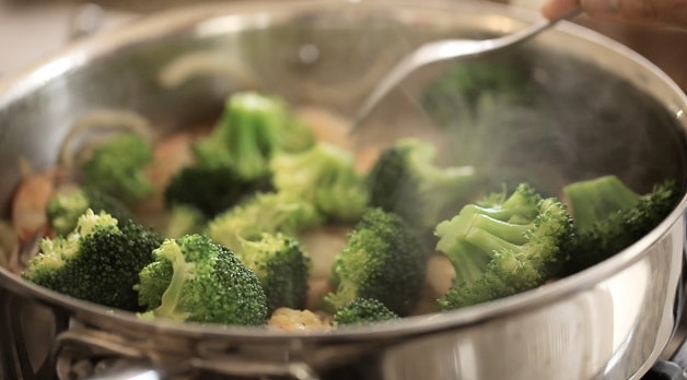 cooking Broccoli florets in pan