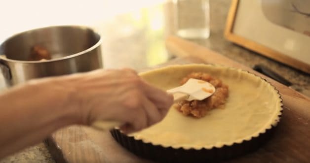 Spreading Apple Compote into a tart shell