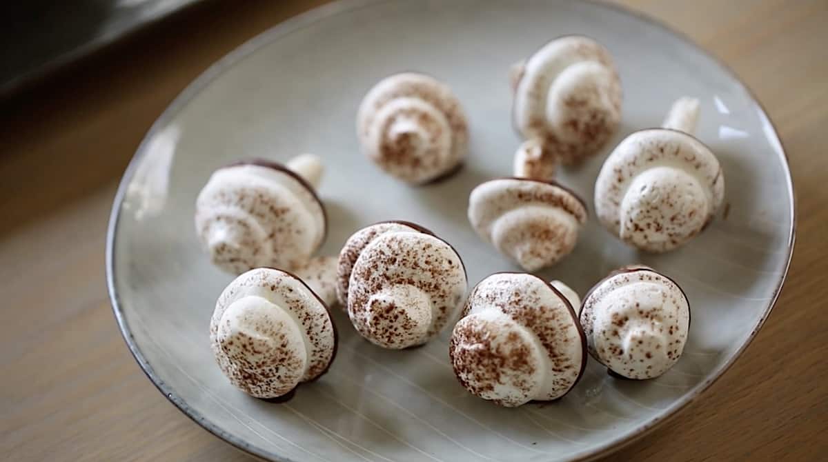 a plate of meringue mushrooms