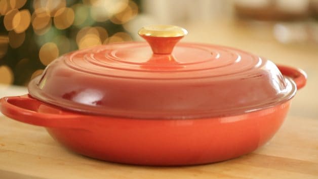 Le Creuset Braiser in red with a gold knob