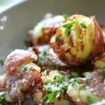 Smashed Potatoes in a gray bowl