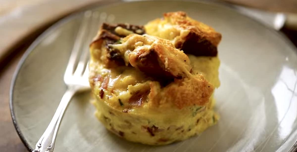 a mini egg bake on a plate with fork