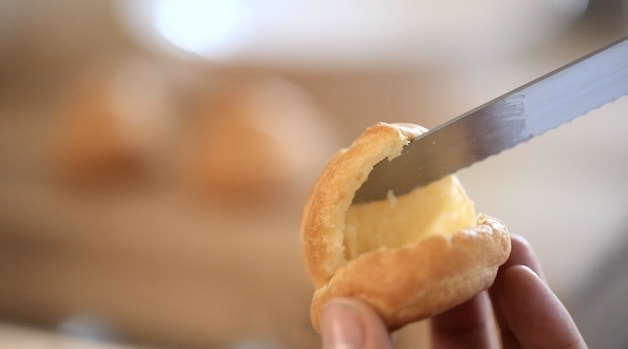 Tight shot of sliced profiterole showing interior