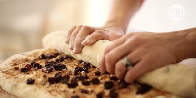 Rolling log of dough for sticky buns