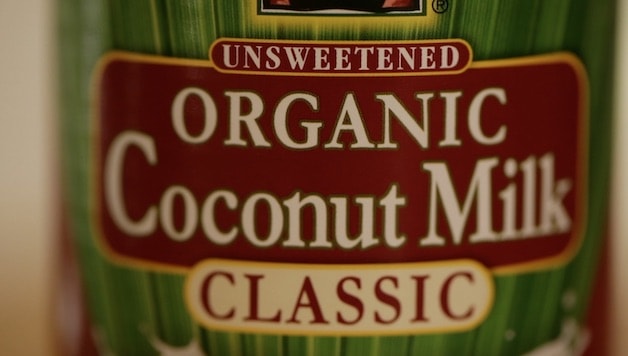 Tight Shot of a can of coconut milk labeled classic coconut milk 