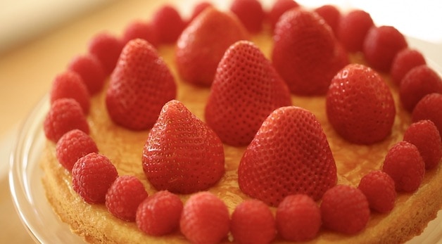 strawberries and raspberries placed on a Sable Breton Crust