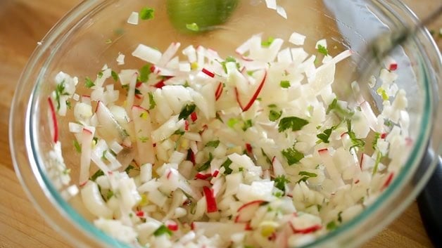 Onion and Radish Relish in a large glass bowl