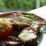 Slow Roasted Lamb Chops with Mustard sauce, carmelized shallots and roasted tomato