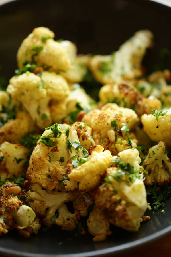 Vertical Image of Roasted Cauliflower and fresh parsley