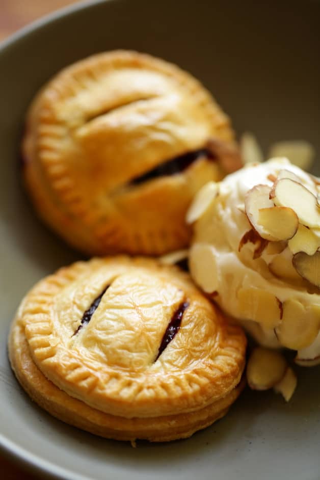 Air Fryer Blueberry Hand Pies with vanilla ice cream and almonds