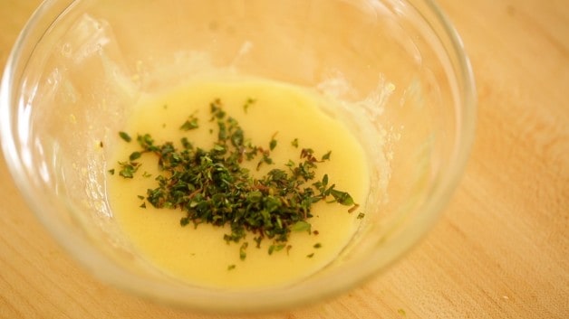 A bowl of Thyme Vinaigrette in a small bowl 