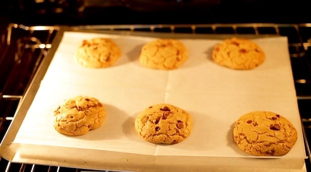 Browned butter chocolate chip cookies in the oven baking