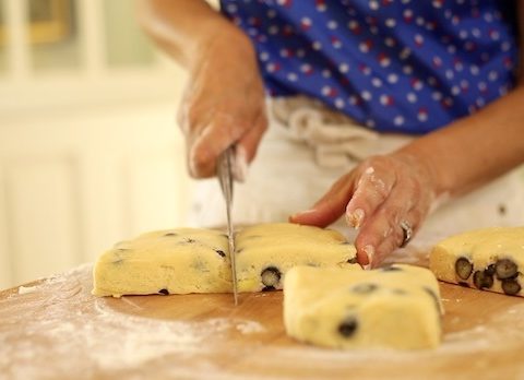 Cutting Blueberry Scones for Baking