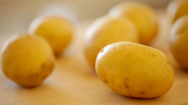 Golden Yukon Potatoes on cutting board