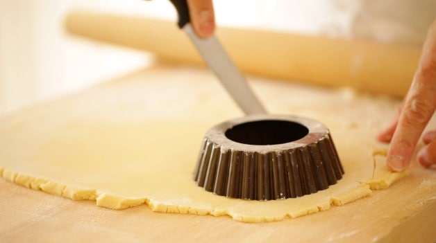 Sizing dough to fit tins for Cherry Bakewell Tart Recipe